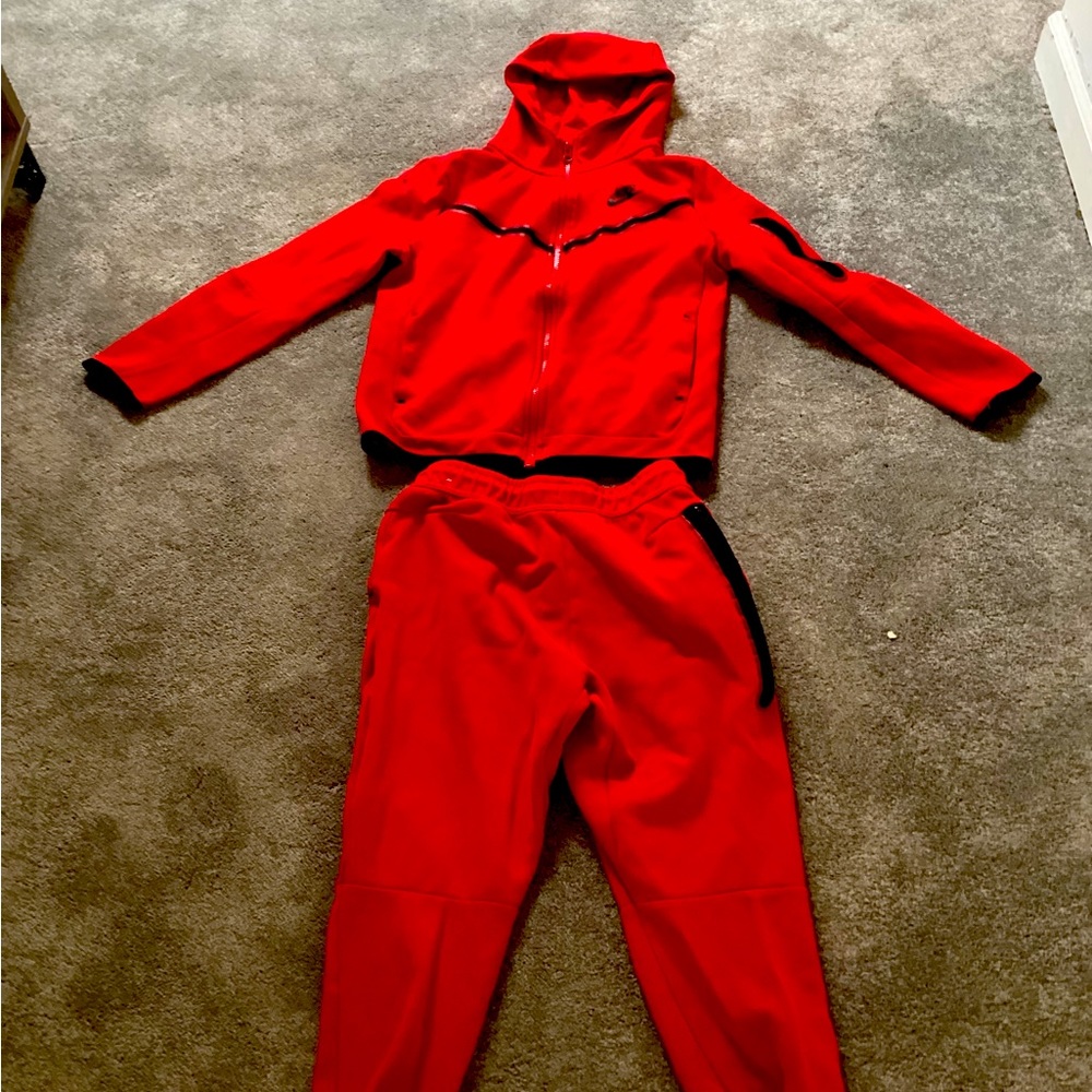 Set of 2 red Nike tech fleece top and bottom size youth large